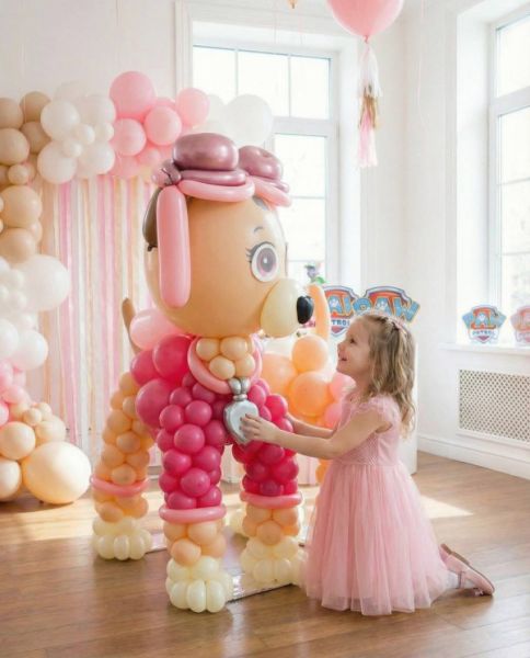 Собачка в розовой кофте