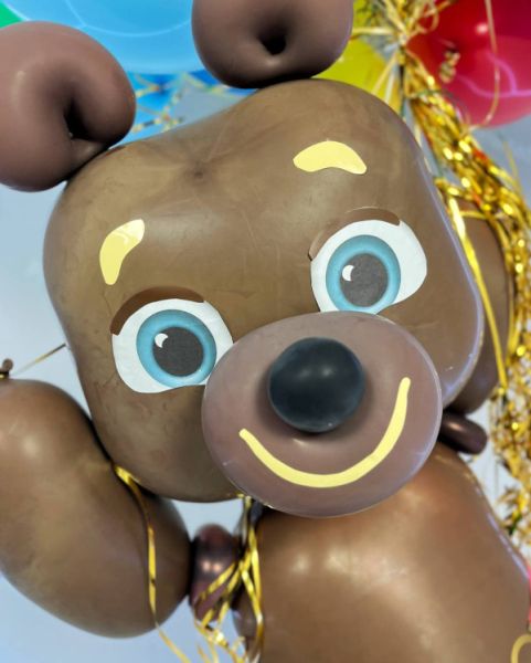 Олимпийский мишка с воздушными шарами